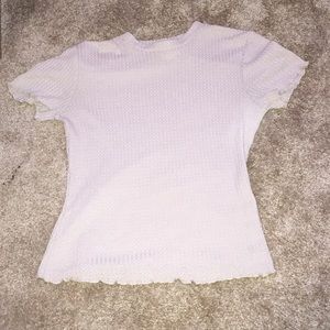 Cropped shirt with frazzled sleeves